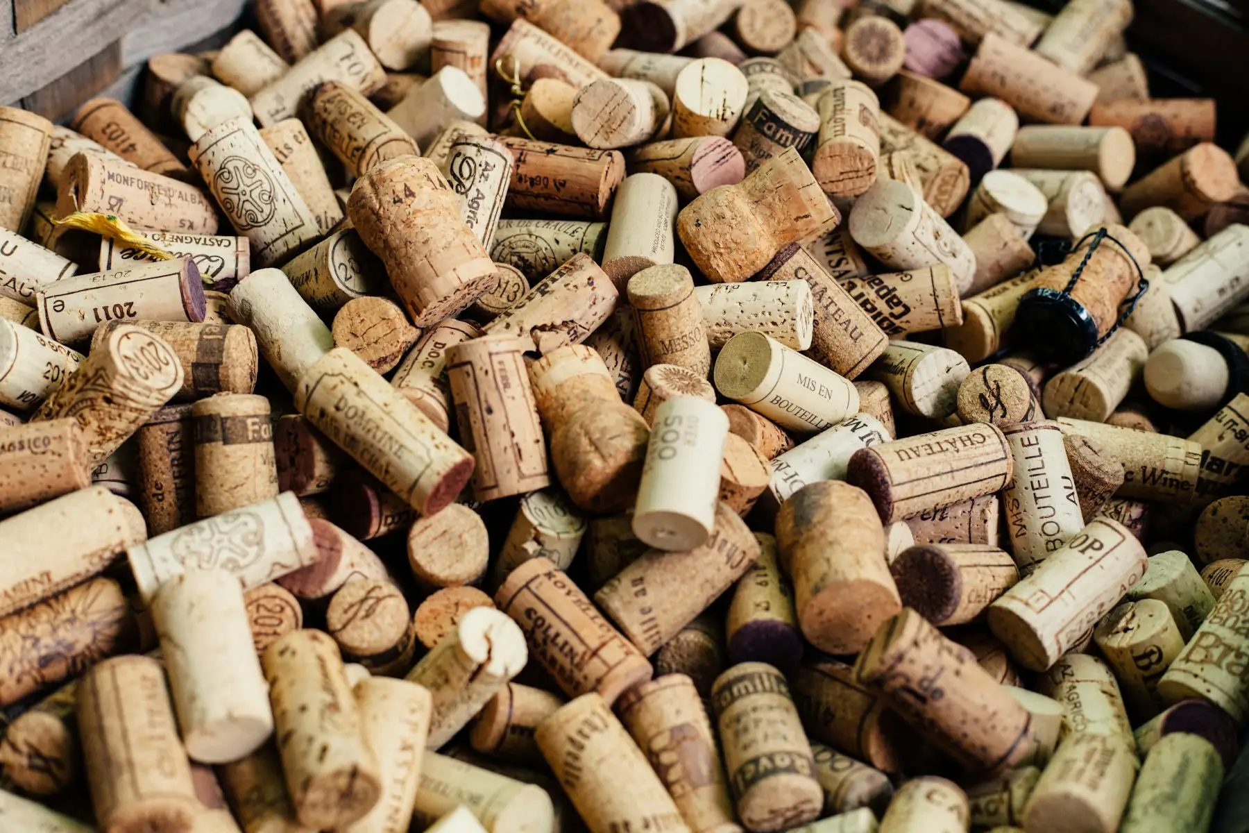 A basket full of used wine corks